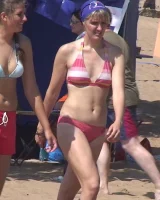 Hot candid babes in bikinis playing beach volleyball