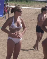 Hot candid babes in bikinis playing beach volleyball
