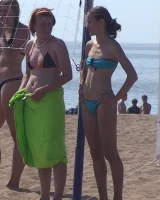 Hot candid babes in bikinis playing beach volleyball