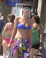 Real candid girls in bikinis walking on the streets