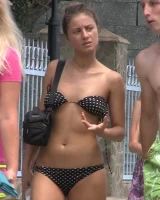 Real candid girls in bikinis walking on the streets