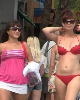 Real candid girls in bikinis walking on the streets