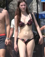 Real candid girls in bikinis walking on the streets