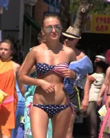 Real candid girls in bikinis walking on the streets