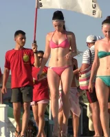 Real candid girls in bikinis walking on the streets