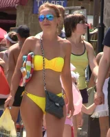 Real candid girls in bikinis walking on the streets