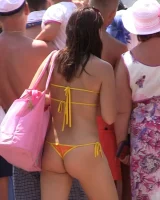 Real candid girls in bikinis walking on the streets