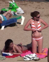 Wonderful candid girls caught in bikini on the beach