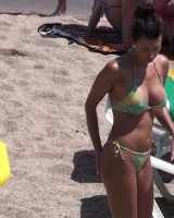 Wonderful candid girls caught in bikini on the beach