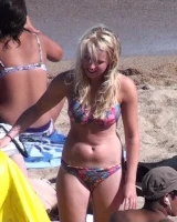 Wonderful candid girls caught in bikini on the beach