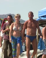 Candid girls with sexy bodies walking on the beach