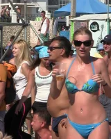 Candid girls with sexy bodies walking on the beach