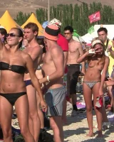 Candid girls with sexy bodies walking on the beach