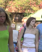 Candid girls with sexy bodies walking on the beach