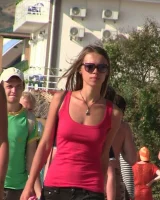 Candid girls with sexy bodies walking on the beach