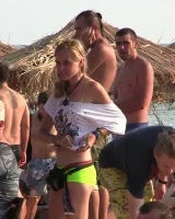 Candid girls with sexy bodies walking on the beach