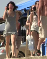 Candid girls with sexy bodies walking on the beach