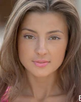 Tall sexy beauty is in the pool in coloful bikini