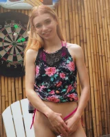 Long summer dress and pink bikini under