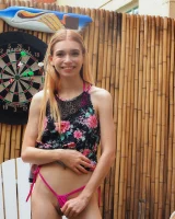 Long summer dress and pink bikini under