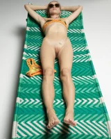 Cute slim body girl in sexy motley bikini