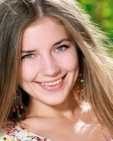 Cute teen Vivian puts the focus on her landing strip twat while naked outdoors