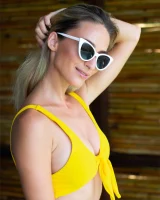 Sexy puffy nipples chick is chillin by the pool in yellow bikini