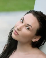 Hot puffy nipples brunette wearing purple bikini by the pool