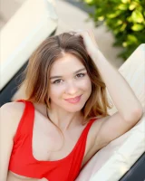 Blissful petite chick in red swimsuit