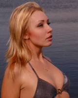 Blonde beauty is by the lake in sexty bikini