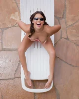 Latin baby resting in sexy bikini and black sunglasses