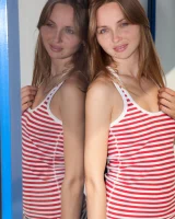 Slim body puffy nipples chick in sexy stripped bikini