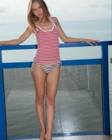 Slim body puffy nipples chick in sexy stripped bikini