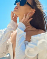 Passionate brunette in white micro bikini has puffy nipples