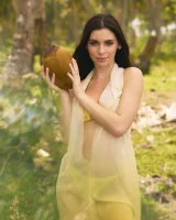 Exciting nude beach busty girl in yellow bikini