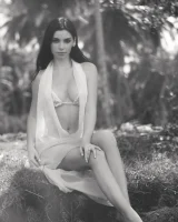 Exciting nude beach busty girl in yellow bikini