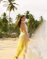 Exciting nude beach busty girl in yellow bikini