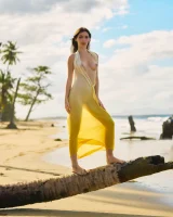 Exciting nude beach busty girl in yellow bikini