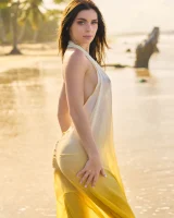 Exciting nude beach busty girl in yellow bikini