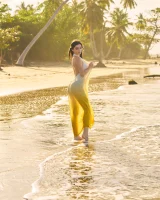 Exciting nude beach busty girl in yellow bikini