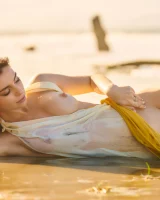 Exciting nude beach busty girl in yellow bikini