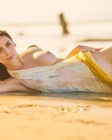 Exciting nude beach busty girl in yellow bikini