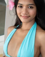 Asian chick with puffy nipples wearing sexy bikini