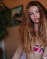 Young puffy nipples fairy in motley bikini