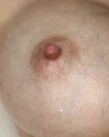 Young big boobs redhead with puffy nipples in sexy blue bikini