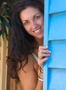 Tall hairy pussy Caitlin in pink bikini going nude at the house entrance